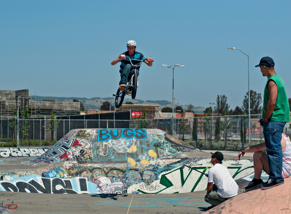 Long jump  contestant throwing it down.