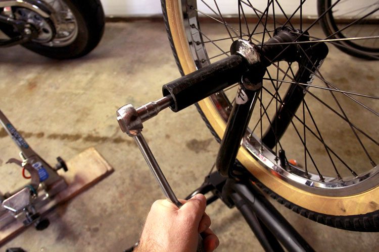 bmx-bike-maintenance-tips-tighten-wheel